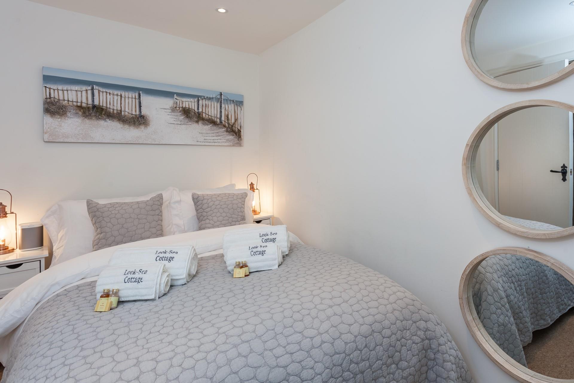 Snuggle under the soft sheets for a relaxing night's sleep.