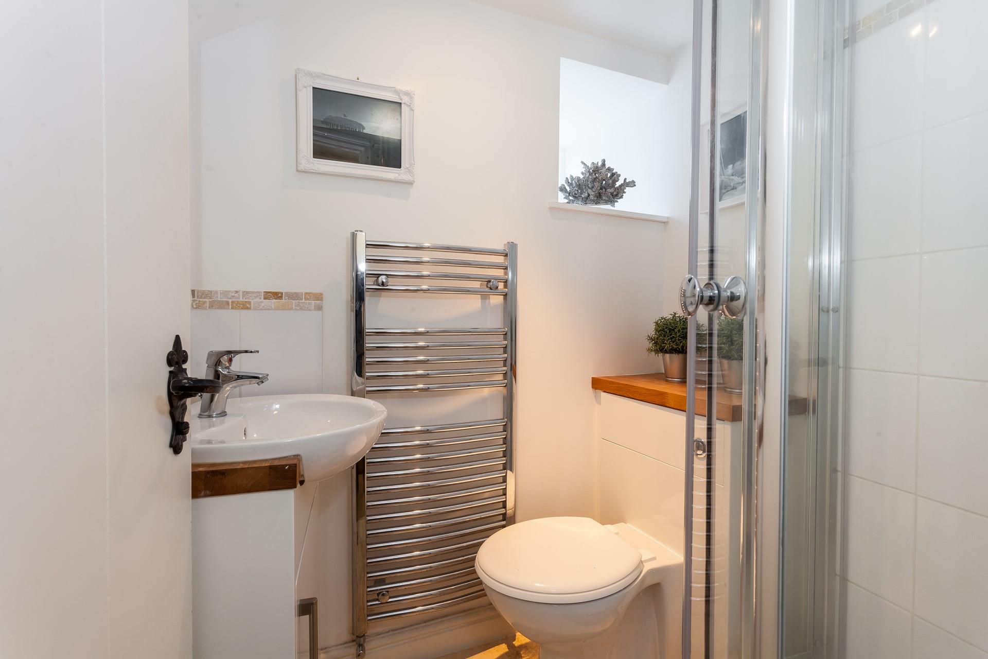 Wash off your sandy toes and salty skin in the shower after a day at the beach.