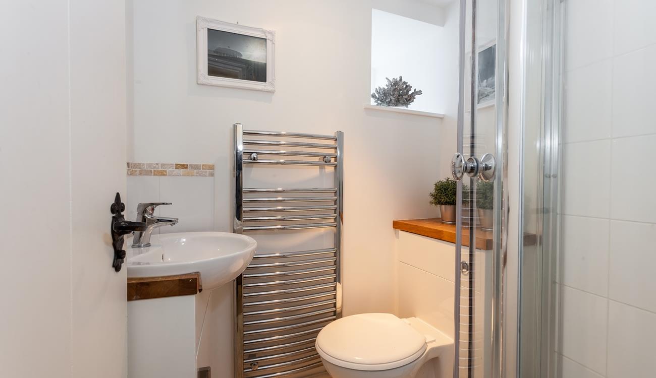 Wash off your sandy toes and salty skin in the shower after a day at the beach.