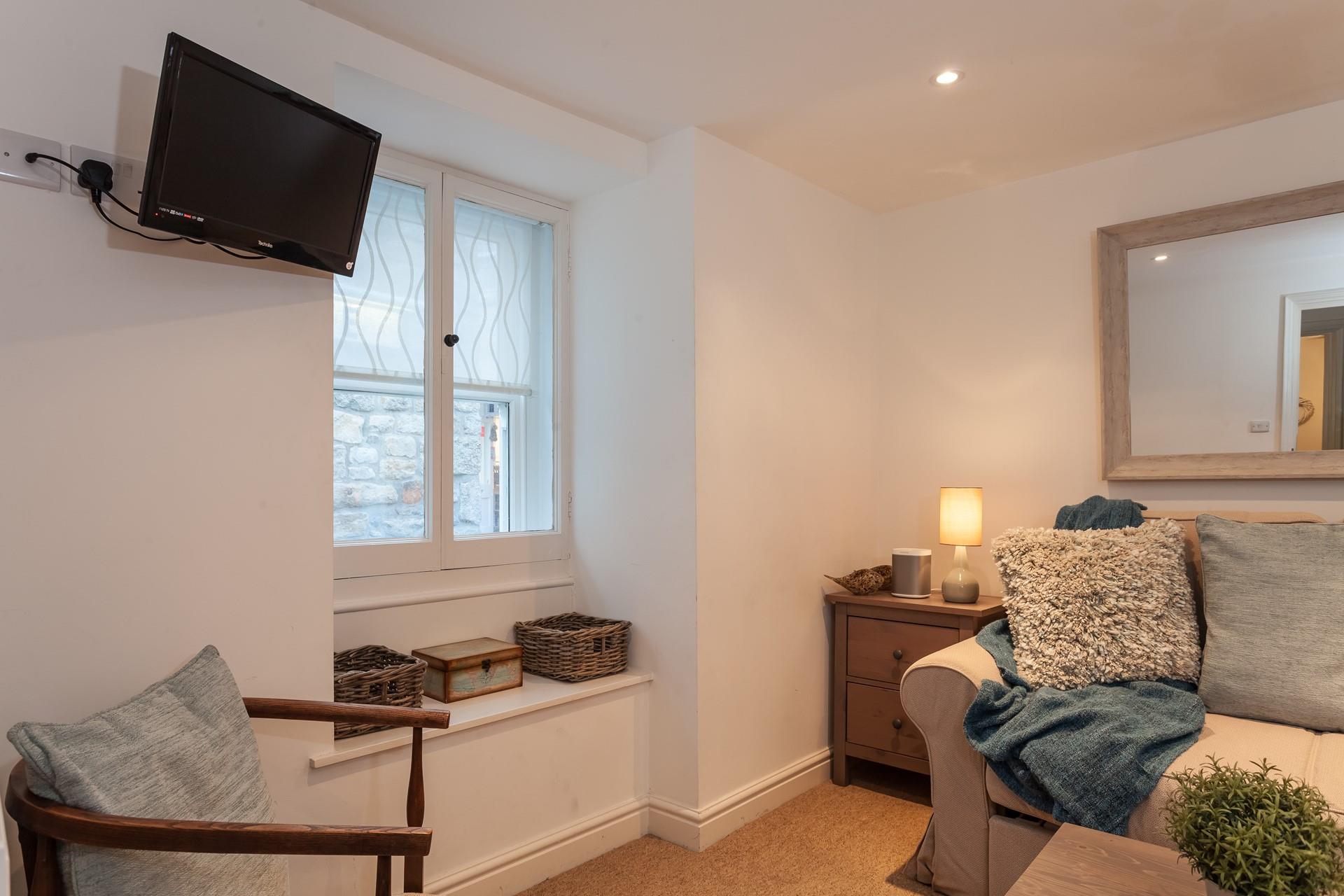 Cosy up in the sitting room with your favourite film on the TV.