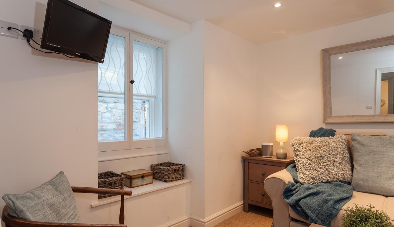 Cosy up in the sitting room with your favourite film on the TV.