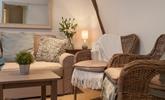 Relax in your cosy sitting room with a glass of wine in the evening. - Thumbnail Image