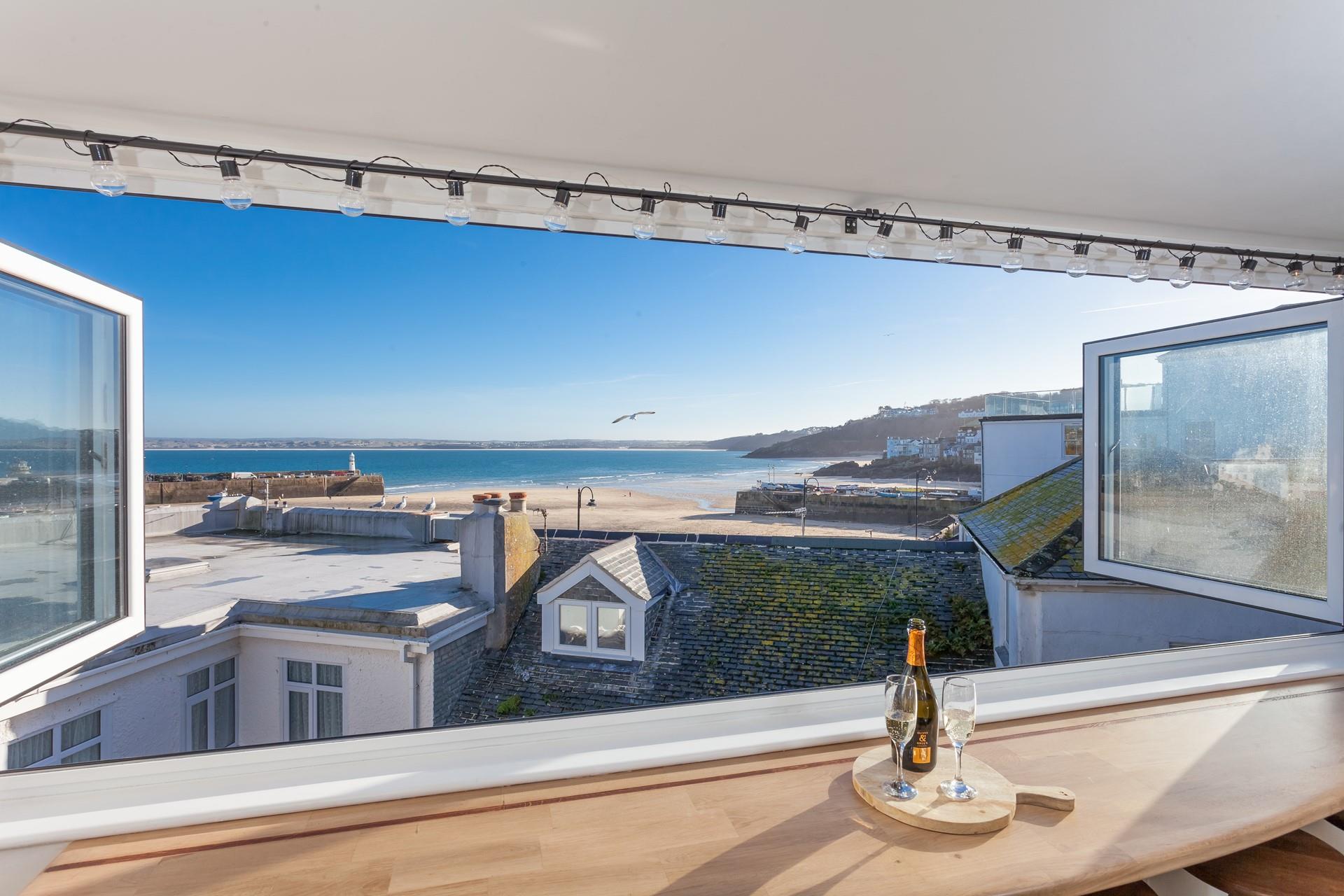 Open a bottle of prosecco and gaze out at the beautiful views of St Ives harbour.