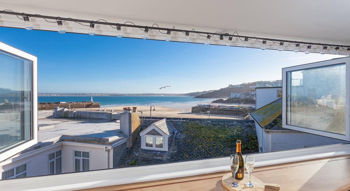 Open a bottle of prosecco and gaze out at the beautiful views of St Ives harbour.