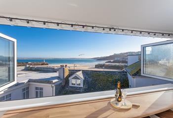 Open a bottle of prosecco and gaze out at the beautiful views of St Ives harbour.