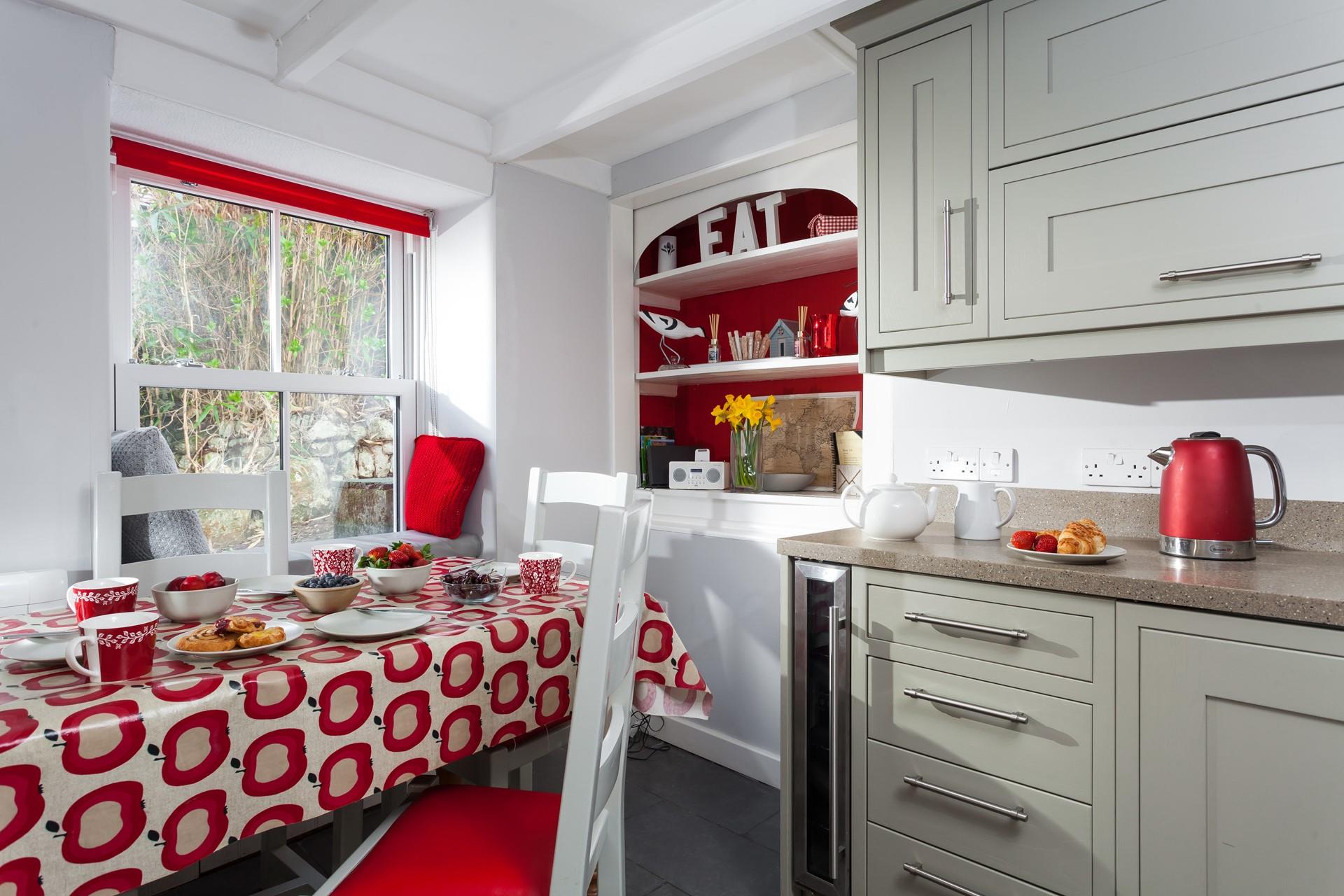 The kitchen is modern and well-equipped for all your culinary needs.