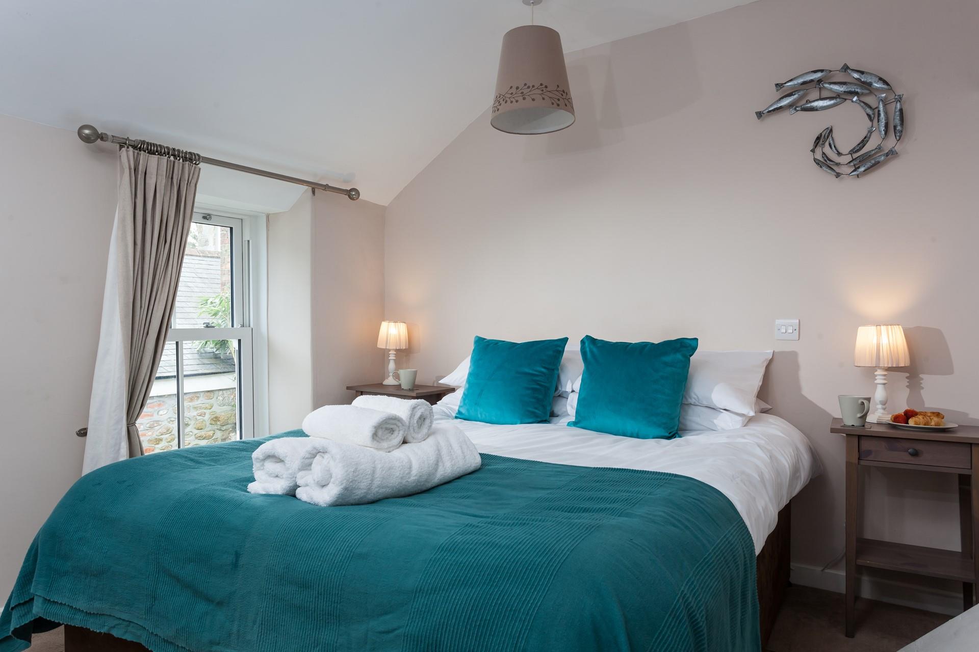 Soft sheets and white fluffy towels await you.