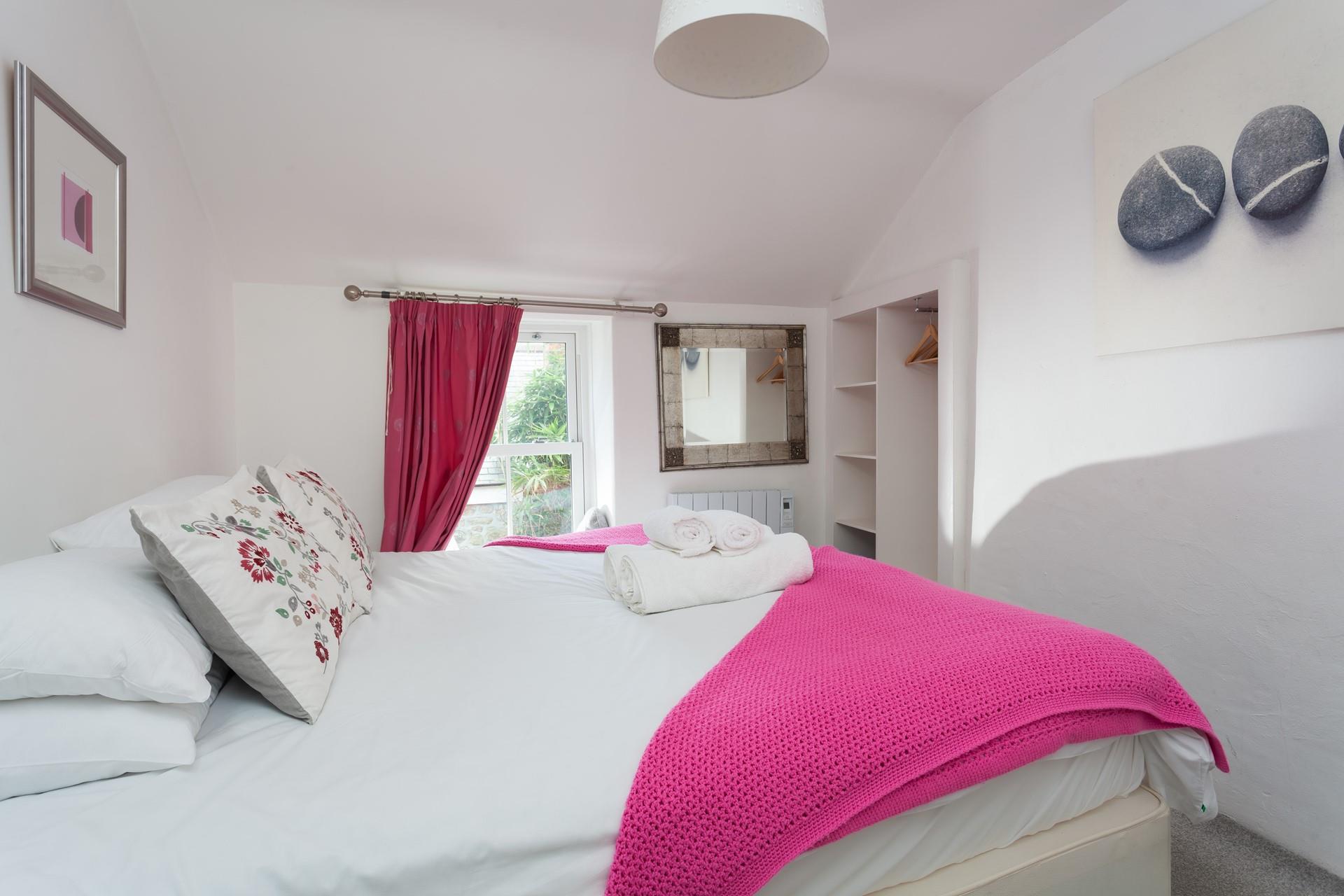 Zip and link beds make this the perfect cottage for families or couples.