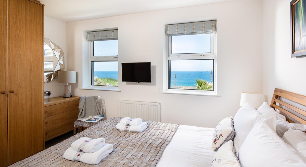 The plush king size bed promises a blissful night's sleep.