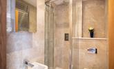 The main bathroom has a wonderful, sleek design with modern fixings. - Thumbnail Image