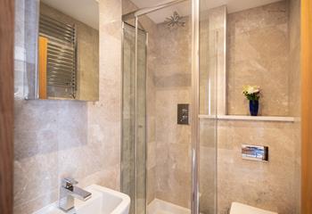 The main bathroom has a wonderful, sleek design with modern fixings.