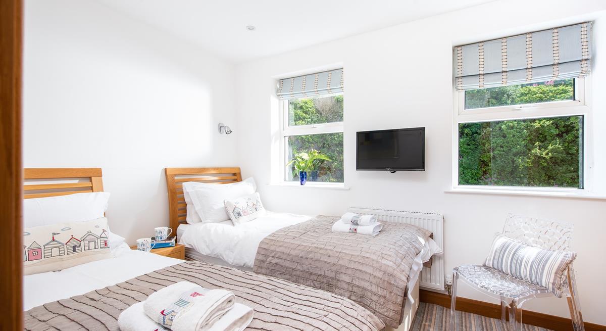 Bedroom 2 benefits from a TV for those lazy mornings in bed.