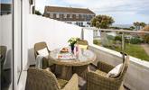 The private balcony is perfect for dining al fresco or soaking up the sun with a glass of something chilled in hand. - Thumbnail Image