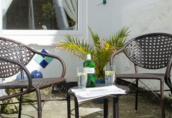 The private courtyard is ideal for enjoying chilled drinks in the sunshine.