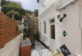 The courtyard is an additional outside space at the house.