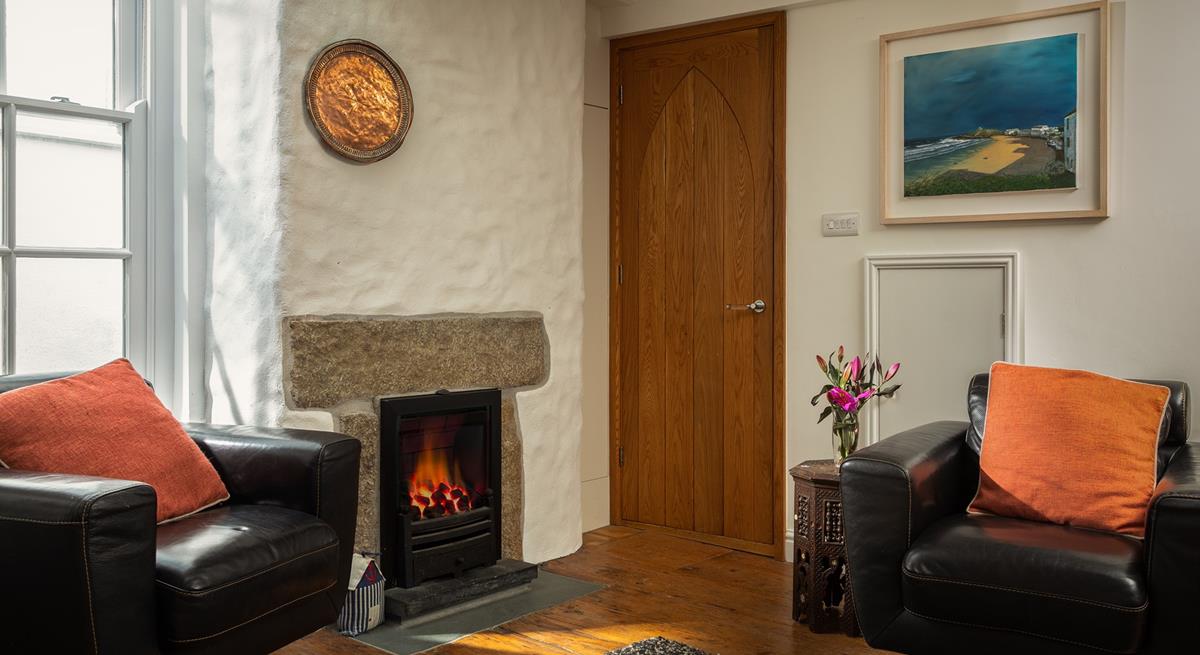 After spending the day on the beach come back to cosy up in the sitting room.