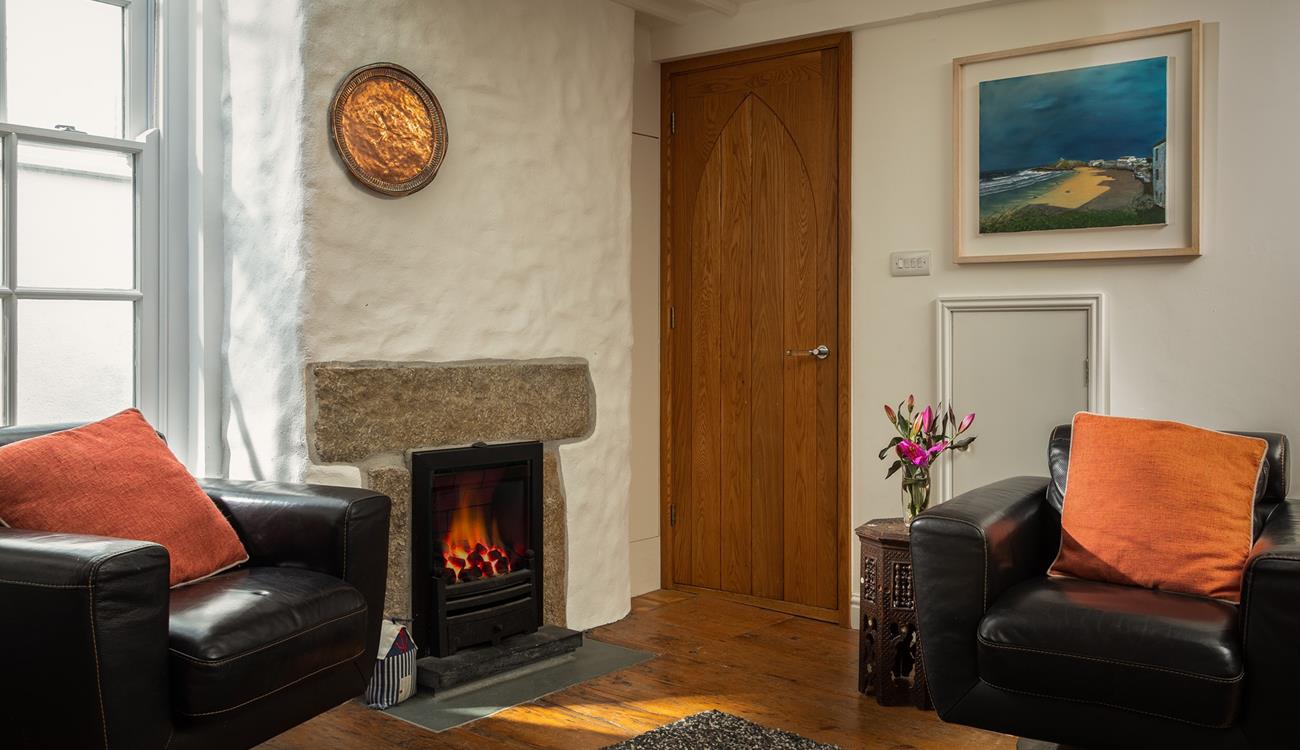 After spending the day on the beach come back to cosy up in the sitting room.