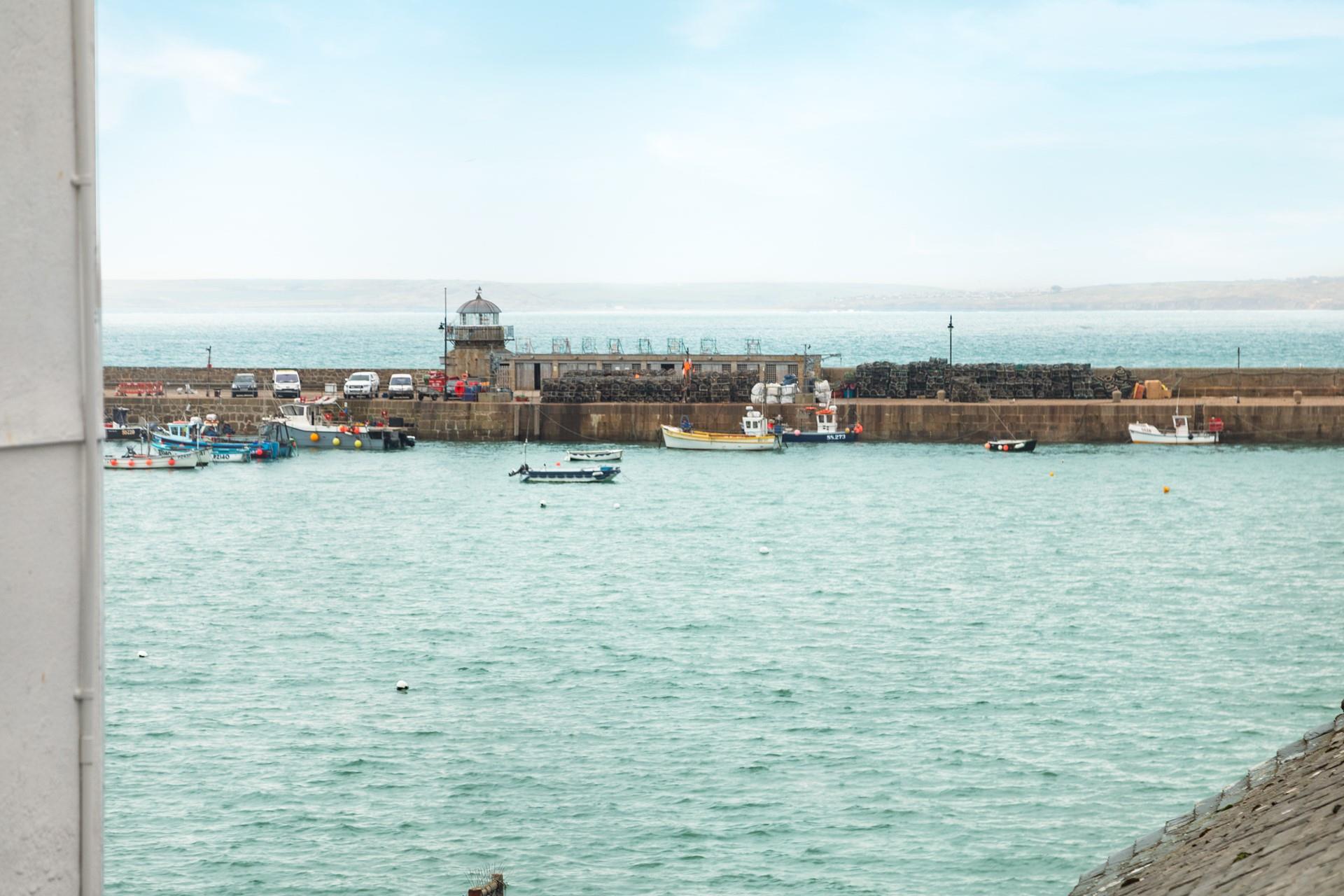 Enjoy sea glimpses from the top floor bedroom.