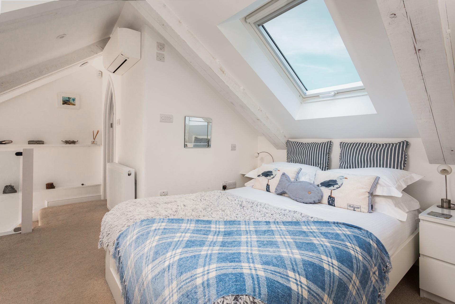 Climb into bed after a busy day spent on the beach.