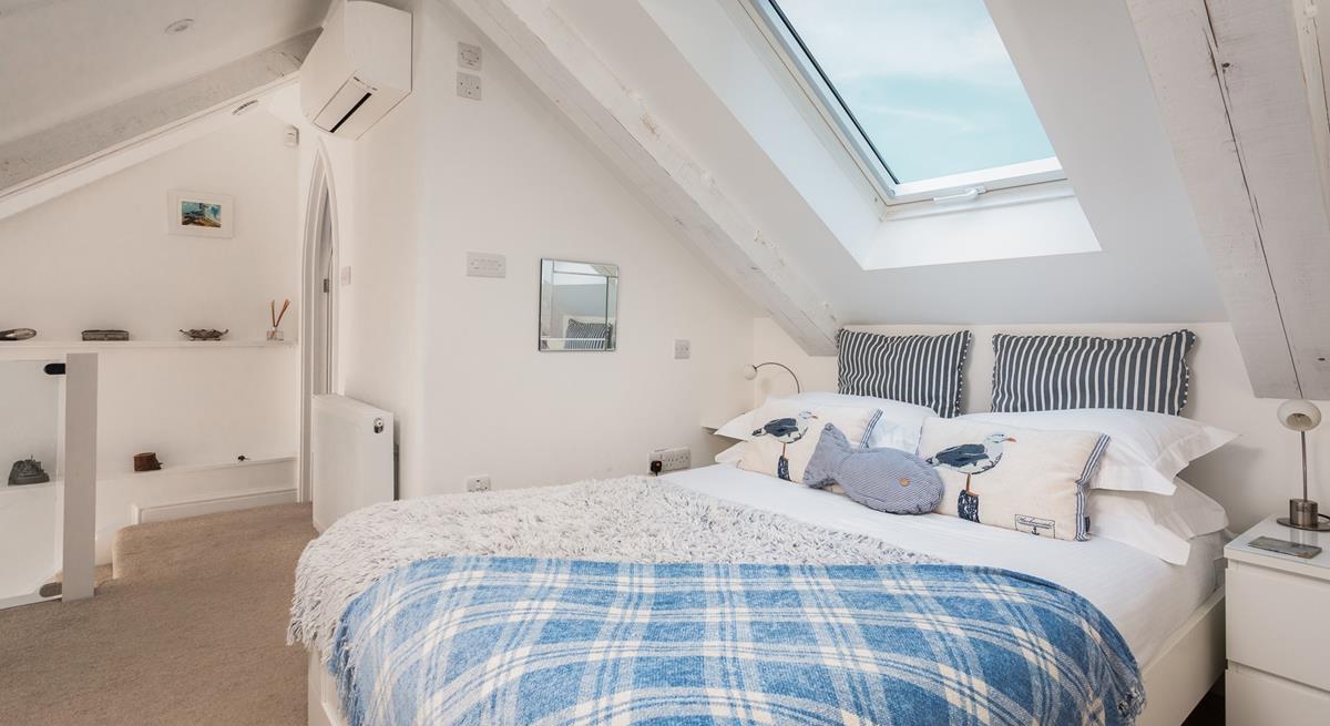 Climb into bed after a busy day spent on the beach.