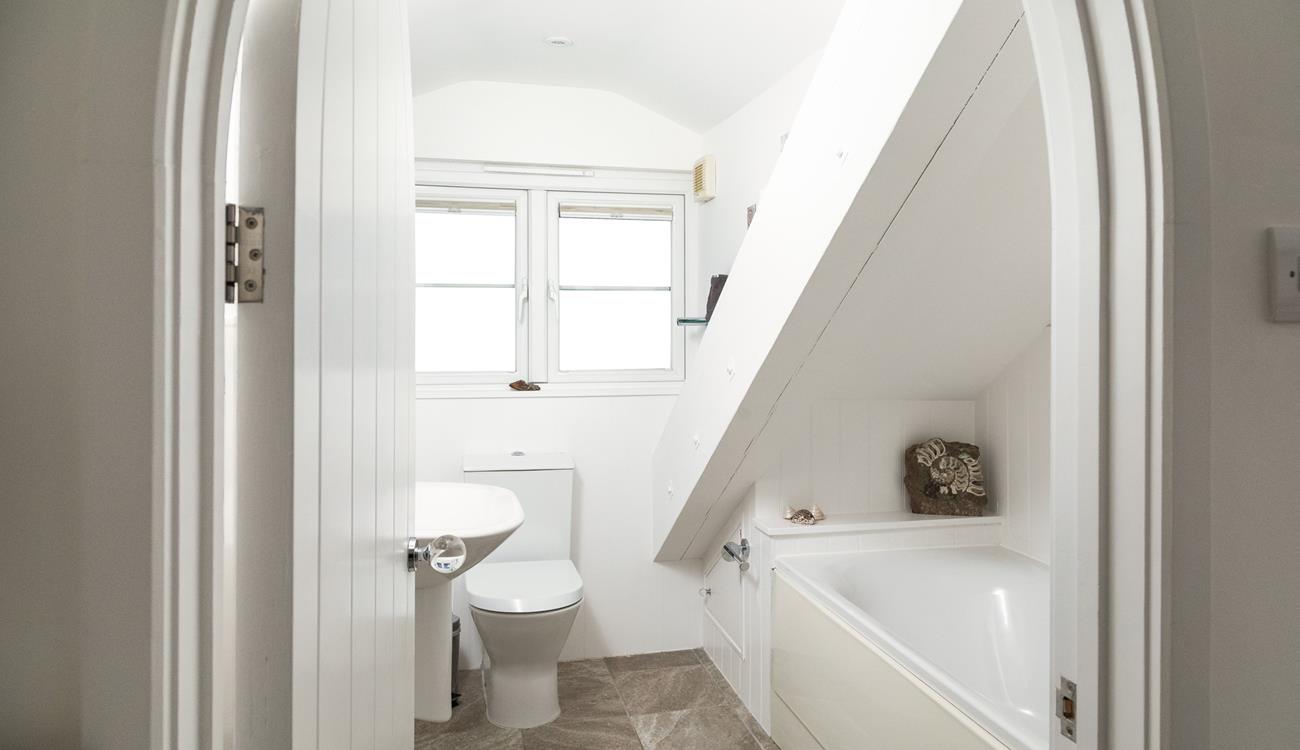 Run yourself a bubble bath in the en suite and unwind.