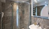 The modern bathroom provides space to get ready in the morning. - Thumbnail Image