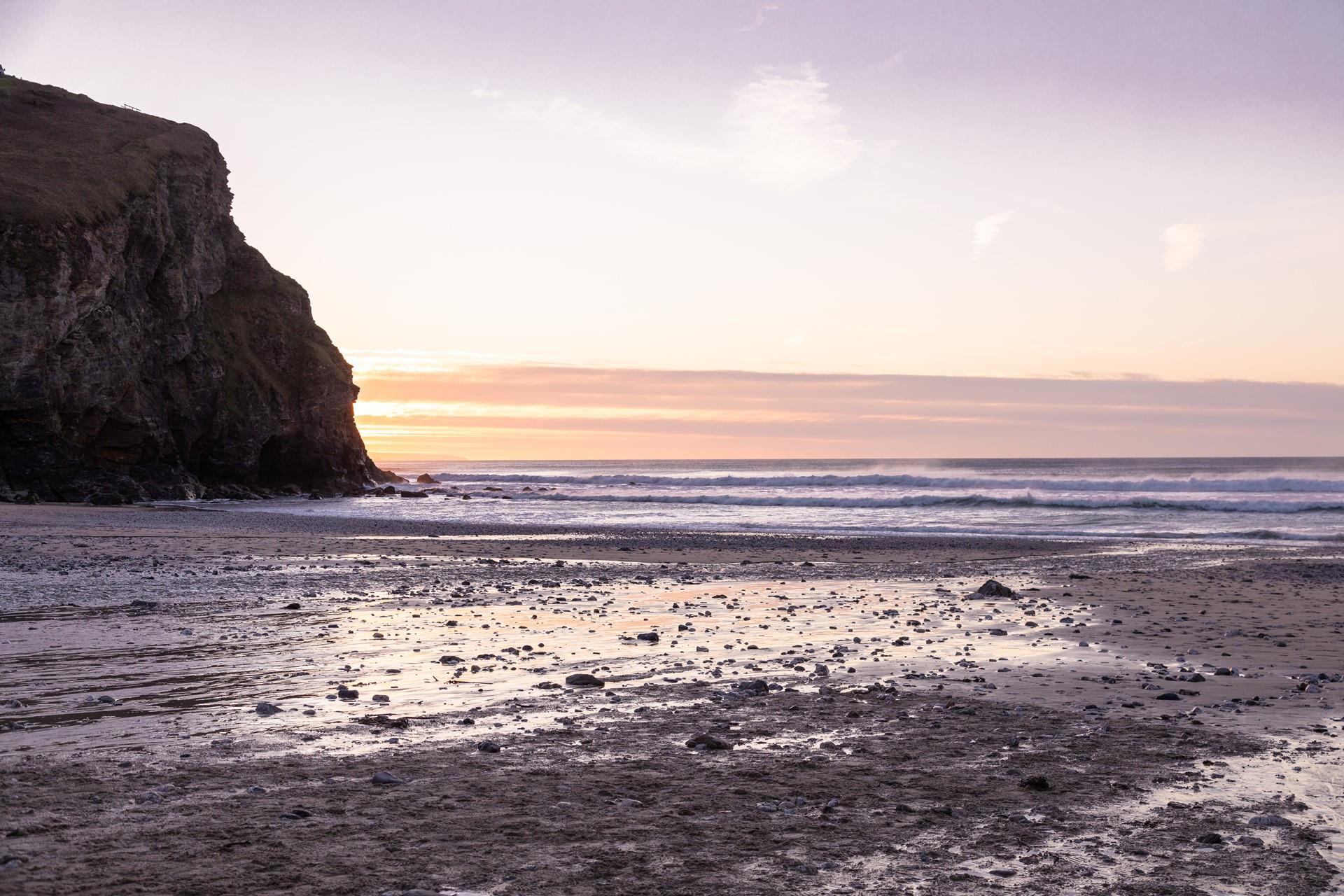 Sit on the beach and watch the sun come down.
