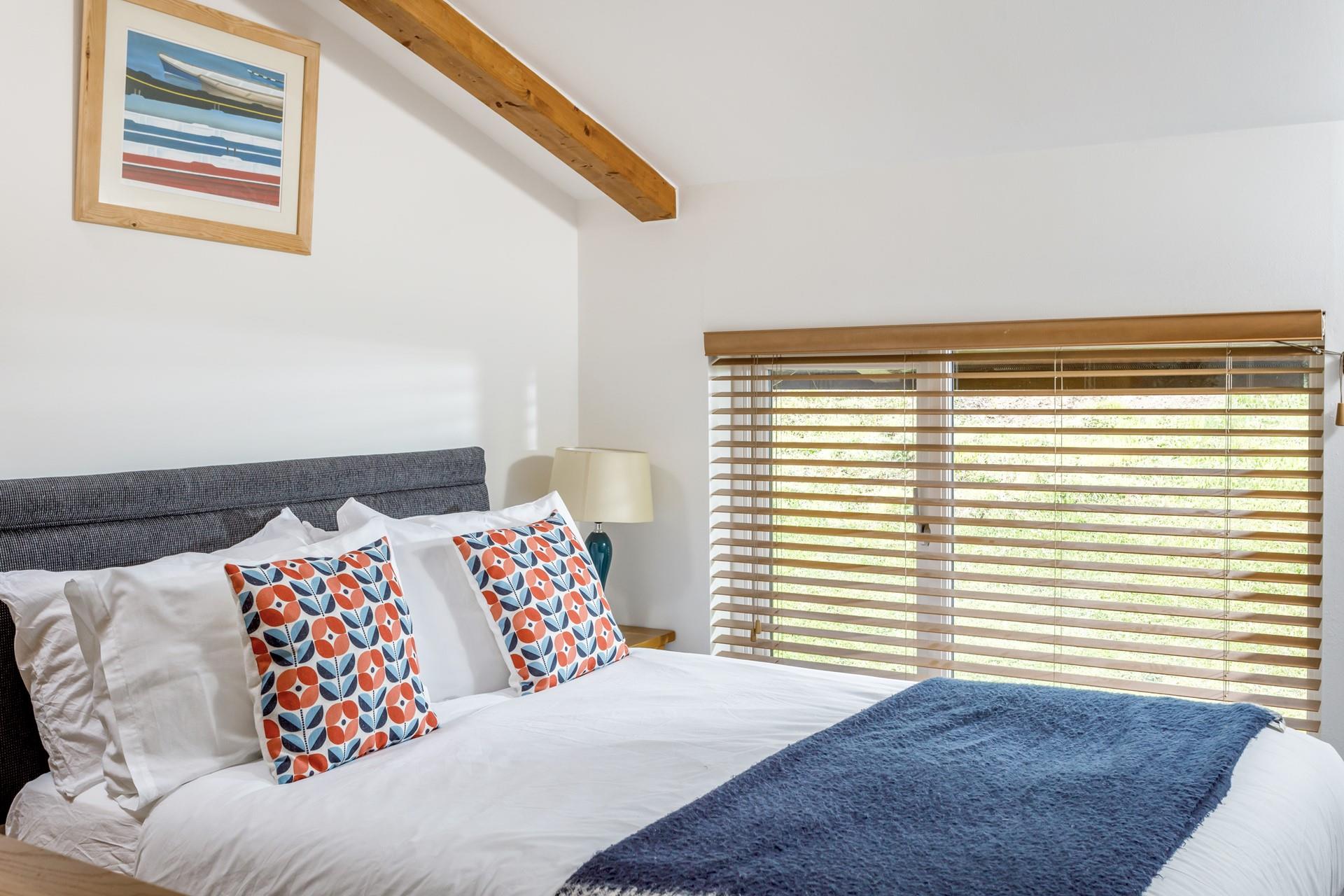 Bedroom 2 offers a double bed and is situated at the rear of the house. 