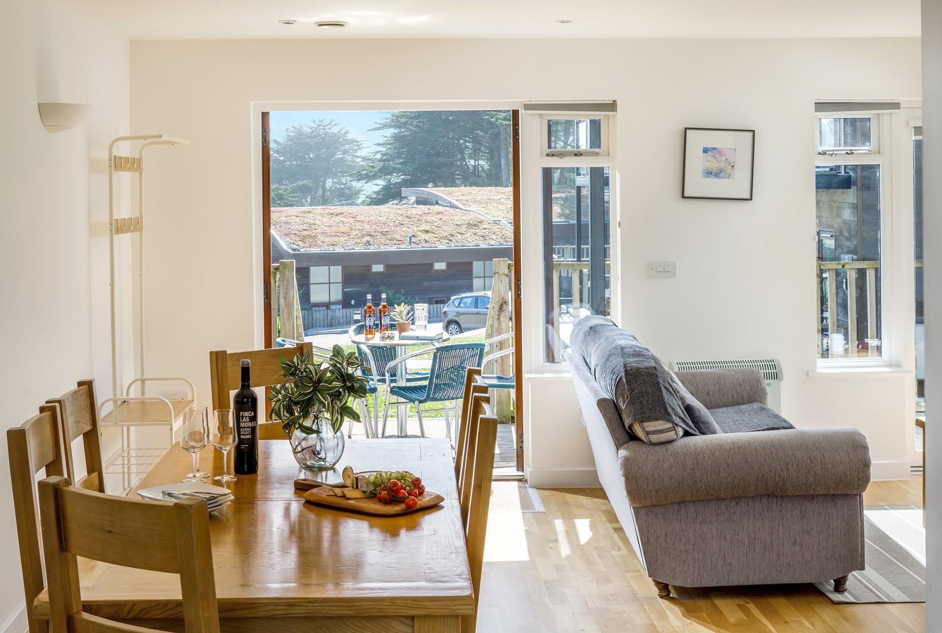 The light and airy living area provides ample space for the whole family to relax and socialise. 