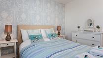Wave watch from your bedroom window whilst enjoying a cuppa in bed.