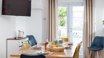 Sit around the table for a family breakfast while you discuss what's on the day's agenda.