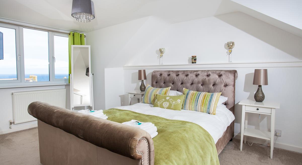 Lie back in the king size bed and wake up to sea views every morning.