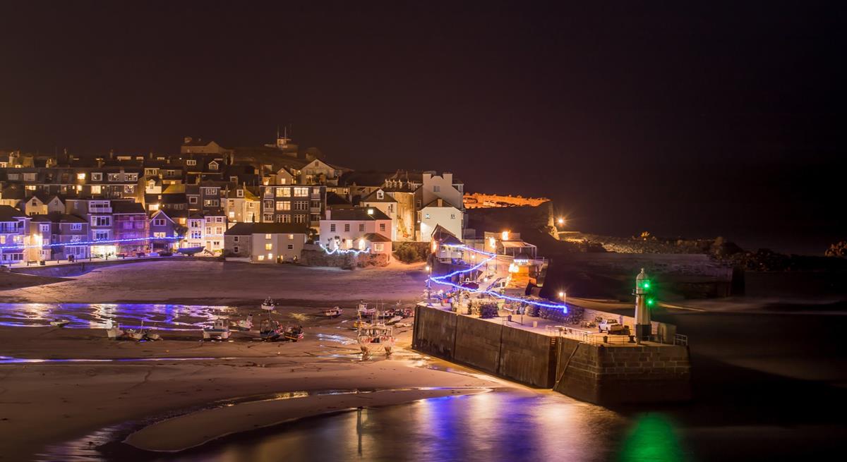 St Ives is magical at Christmas with lights filling the harbour.