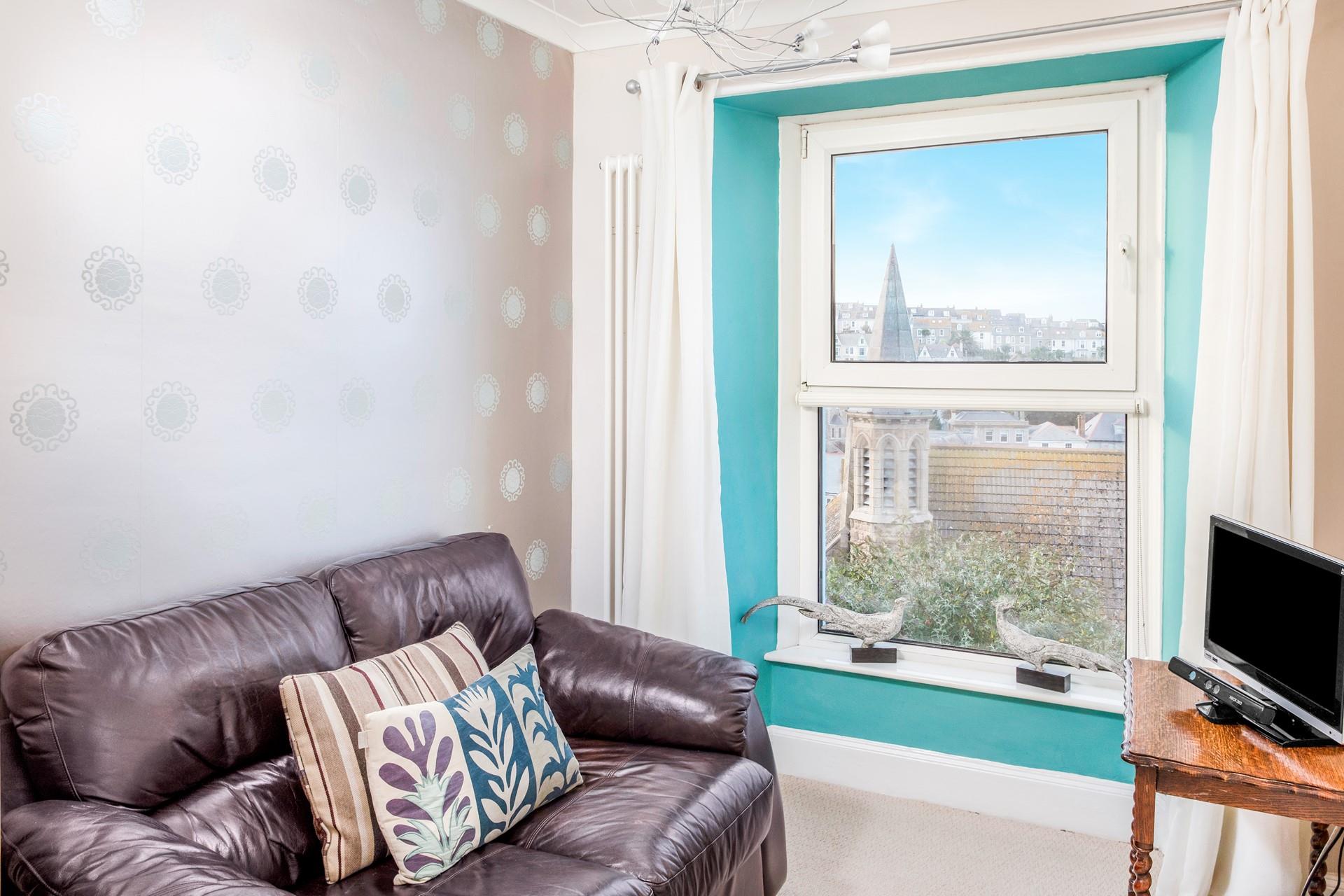 The upstairs snug has an Xbox and games, perfect for the kids!