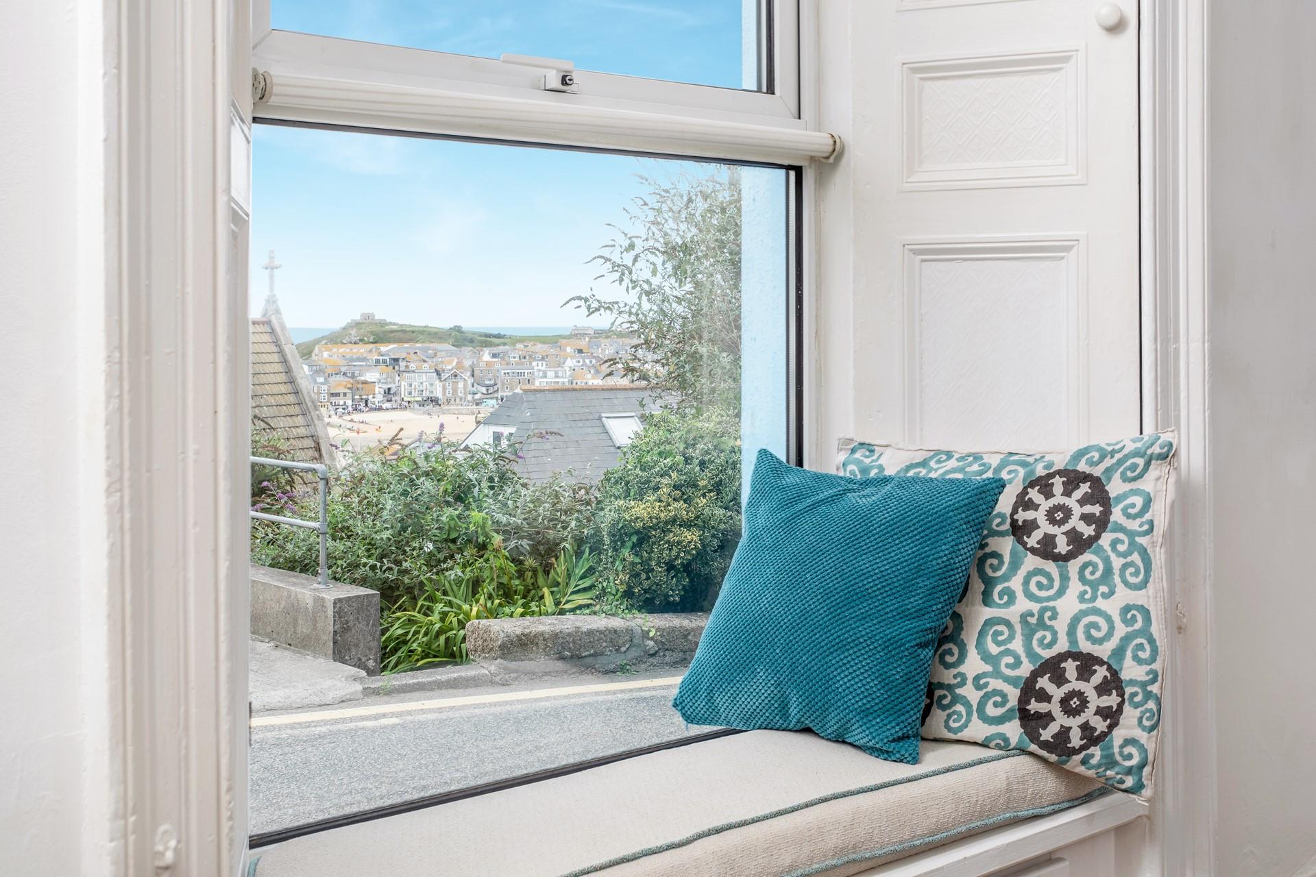 Sit in the window seat with a good book and a cuppa.