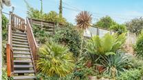 Take advantage of the elevated garden area offering beautiful views.