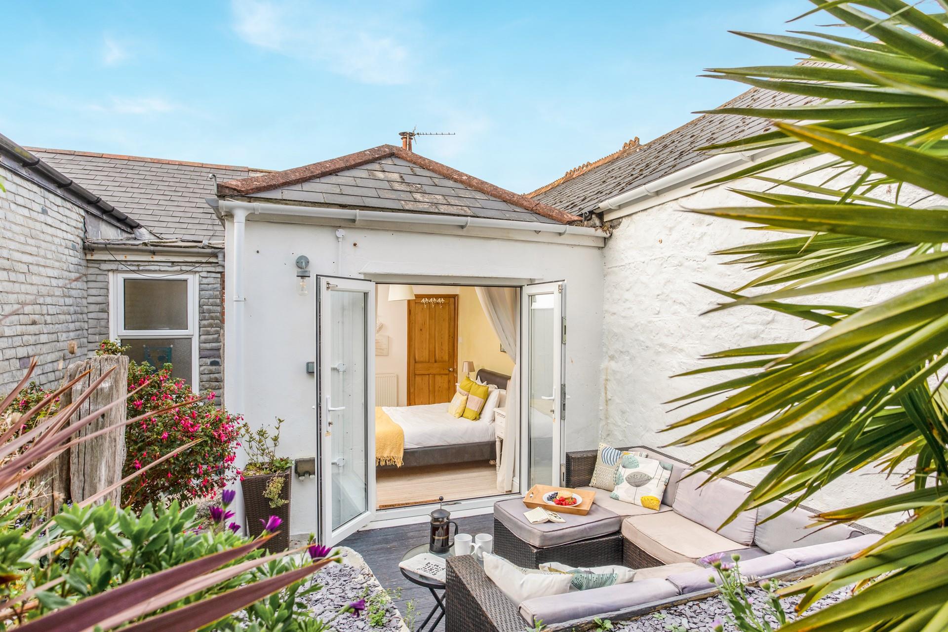 Enjoy the sounds of nature in the leafy garden.