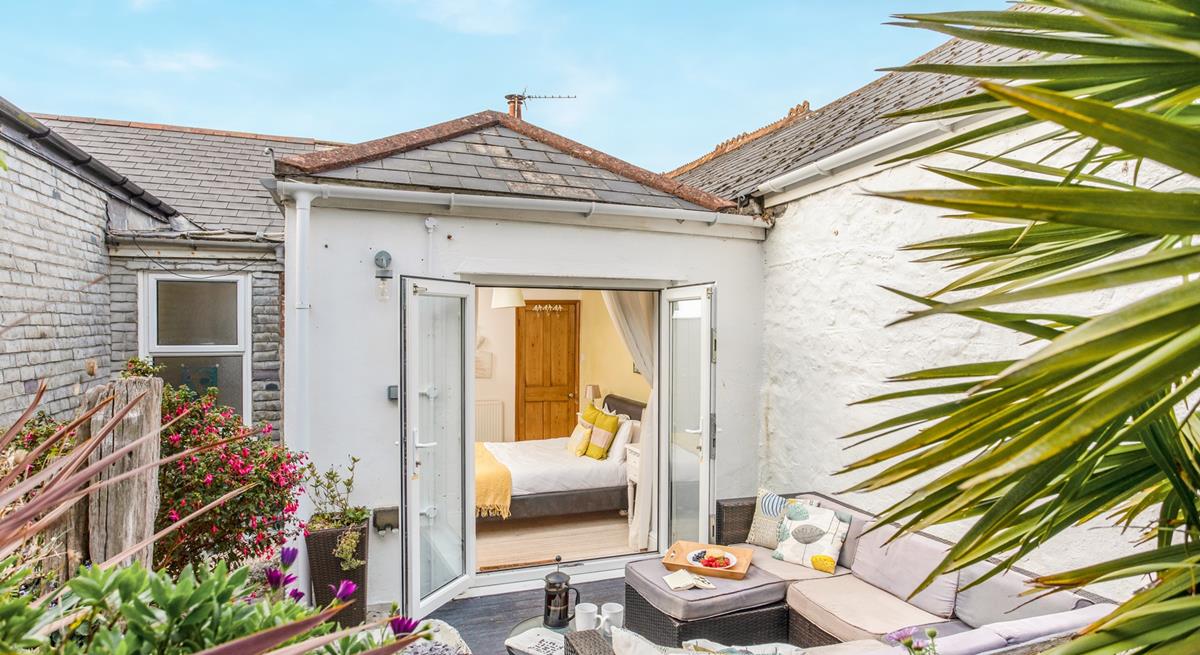 Enjoy the sounds of nature in the leafy garden.