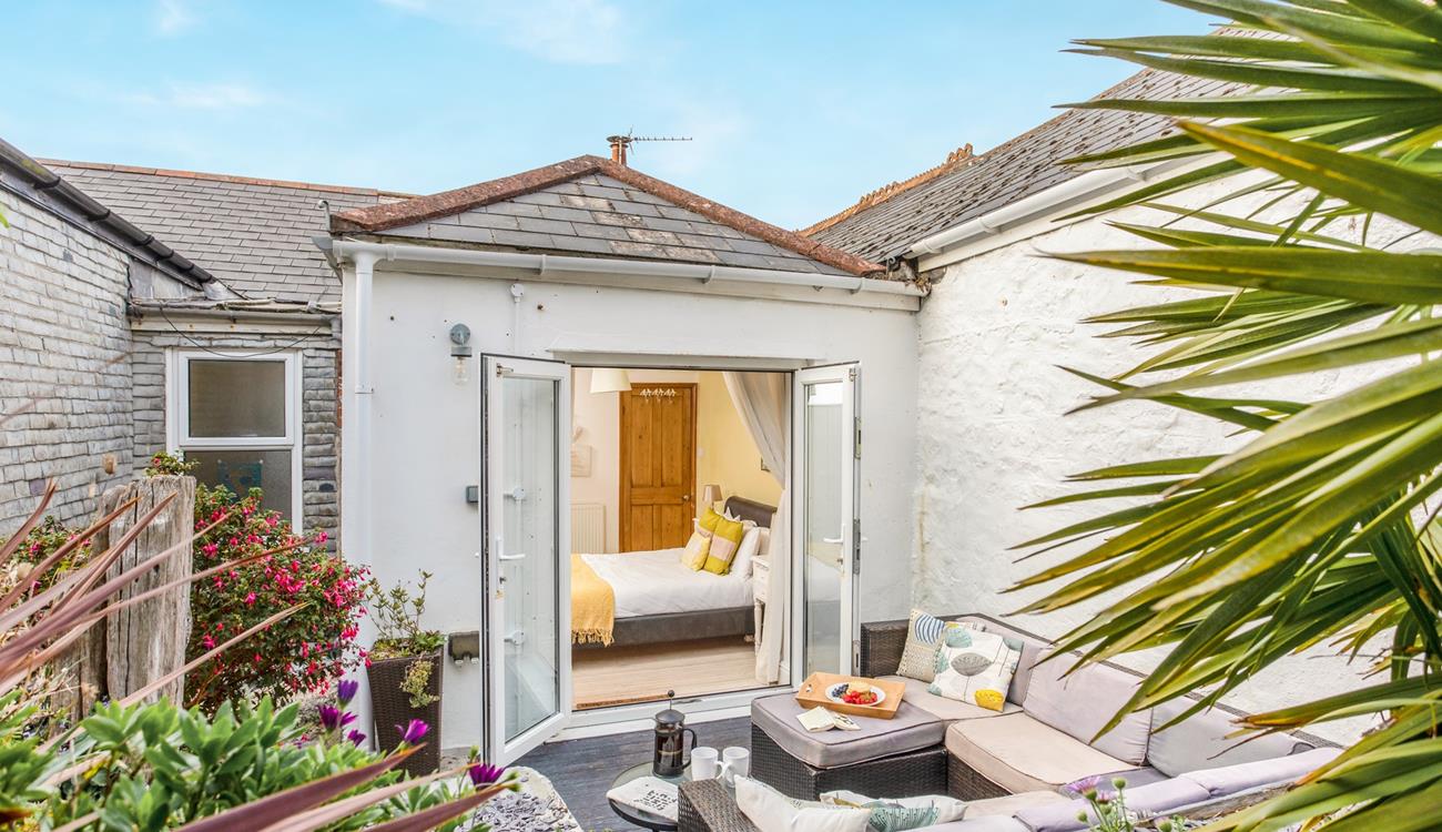 Enjoy the sounds of nature in the leafy garden.