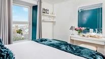 Bedroom 3 as a super king size bed, offering flexible sleeping arrangements.