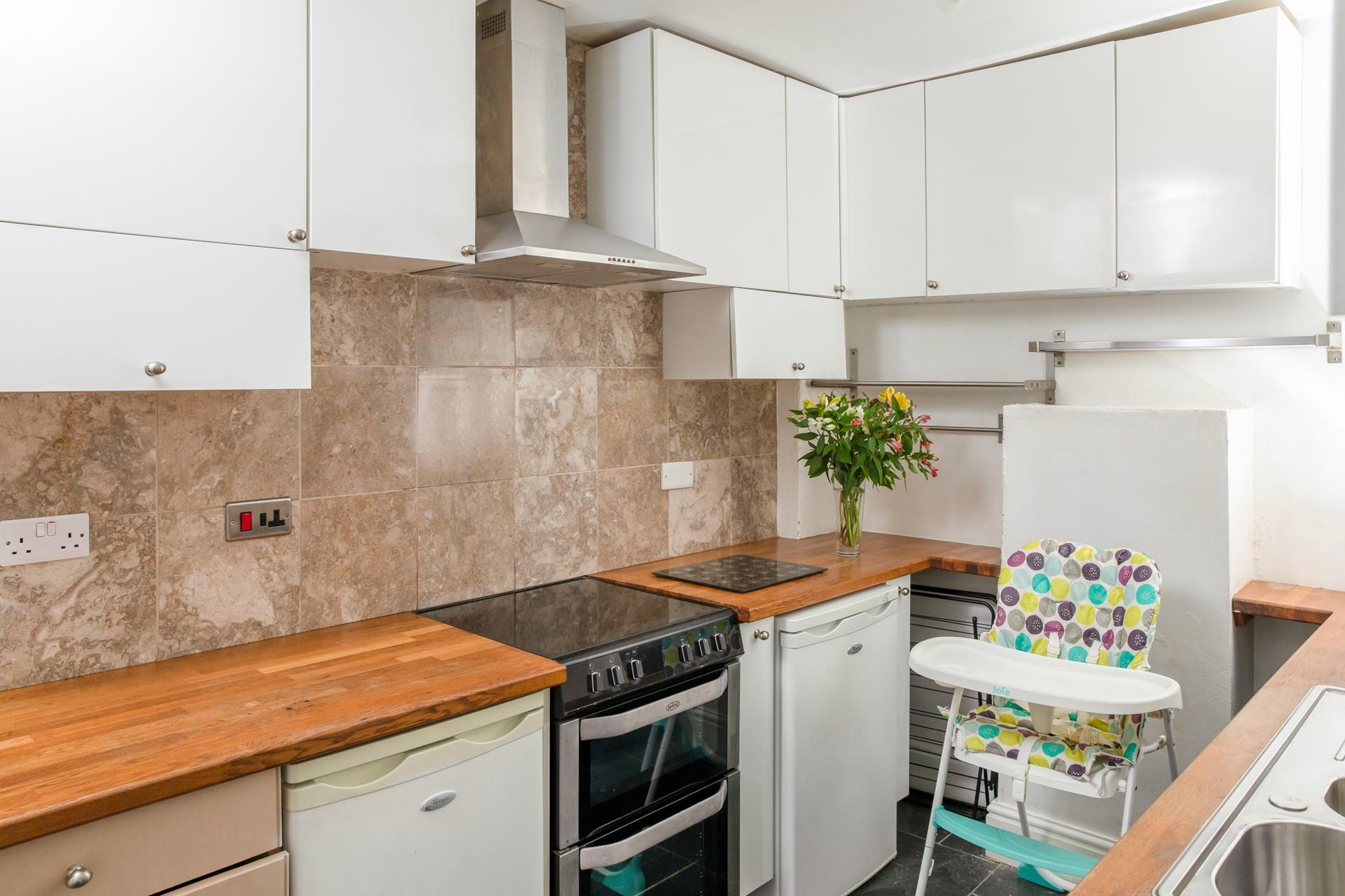 You'll find lots of storage space in the extra kitchen and utility area.