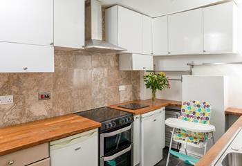 You'll find lots of storage space in the extra kitchen and utility area.