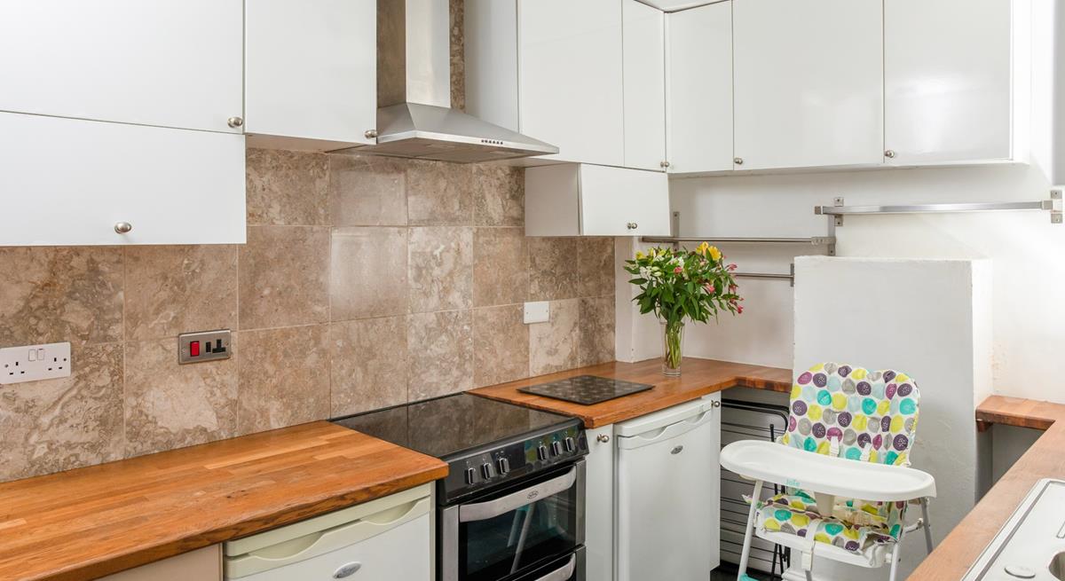 You'll find lots of storage space in the extra kitchen and utility area.