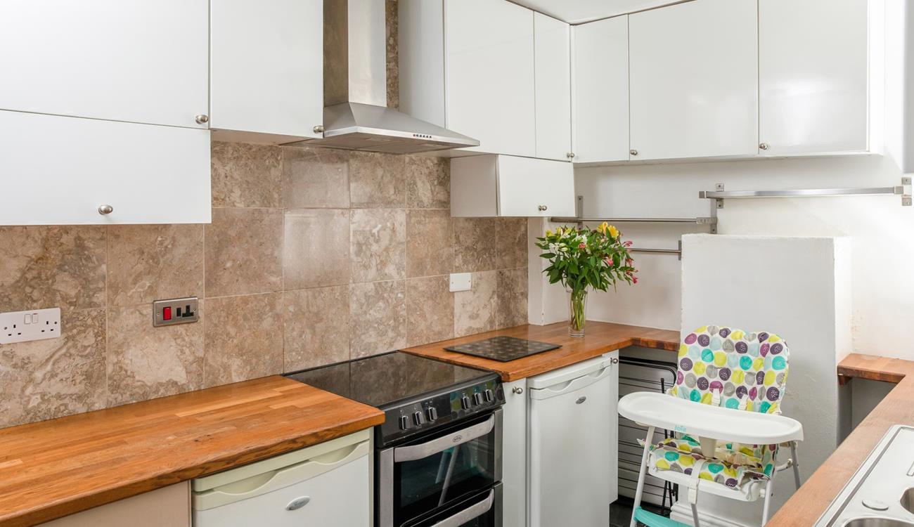 You'll find lots of storage space in the extra kitchen and utility area.