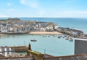 St Ives' iconic harbour as seen from the garden's top seating area.