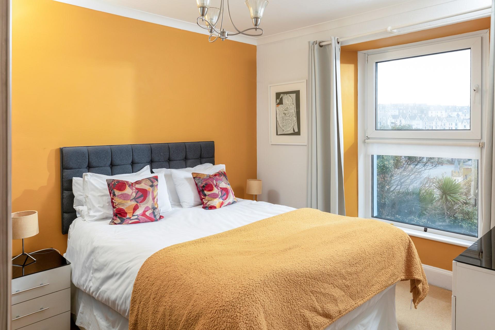 The bright and colourful yellow was chosen to mimic the lichen on the roofs around St Ives!