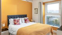 The bright and colourful yellow was chosen to mimic the lichen on the roofs around St Ives!