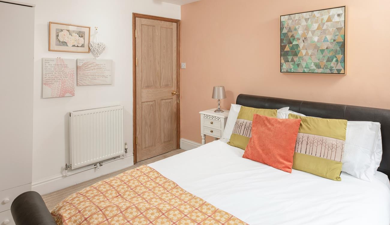 A calming space where you'll drift off easily after a day of coastal exploring.