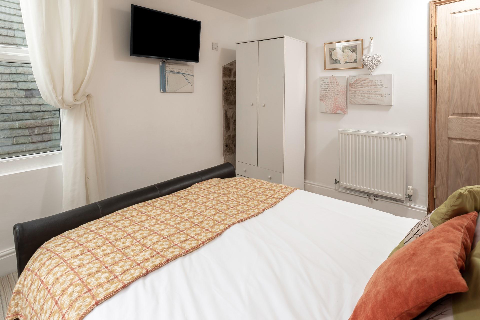 There's plenty of storage in the wardrobe, making unpacking a breeze.