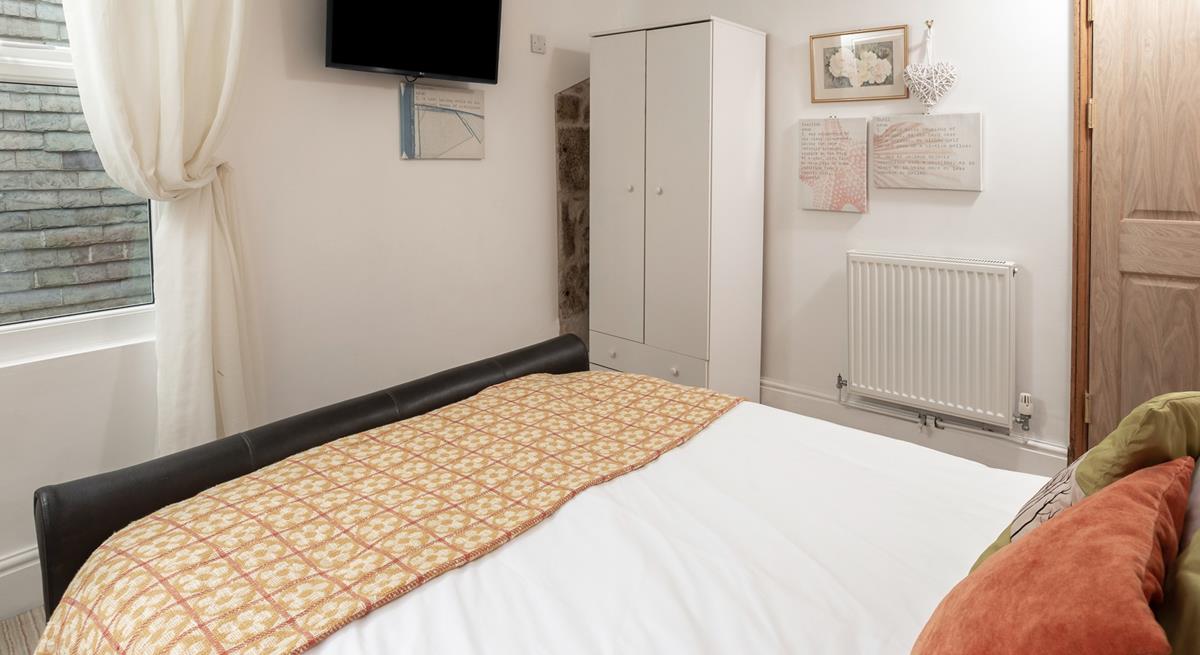 There's plenty of storage in the wardrobe, making unpacking a breeze.